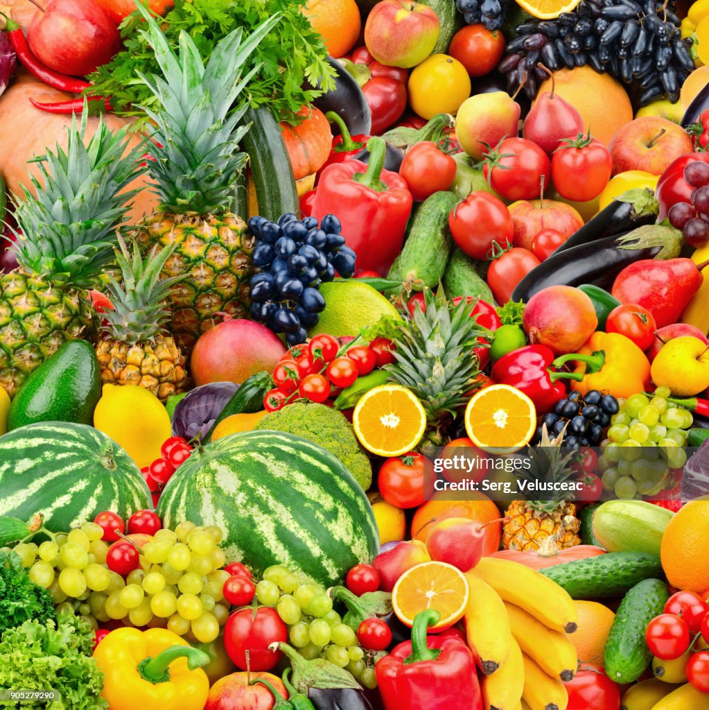 Assorted fresh ripe fruits and vegetables.
