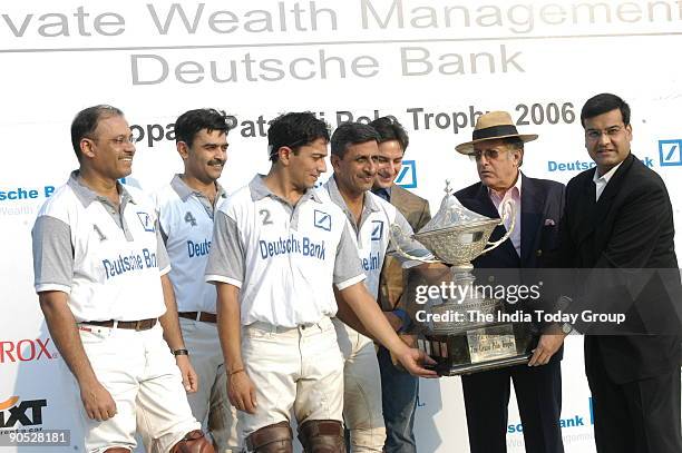 Bollywood actor Saif Ali Khan and his father Mansoor Ali Khan Pataudi with the prize winning team at the Deutsche Bank Bhopal-Pataudi Polo Trophy...