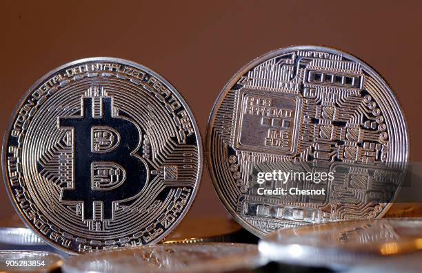 In this photo illustration, a visual representation of the digital Cryptocurrency, Bitcoin is displayed on January 15, 2018 in Paris, France. Bitcoin...