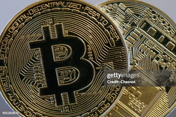 In this photo illustration, a visual representation of the digital Cryptocurrency, Bitcoin is displayed on January 15, 2018 in Paris, France. Bitcoin...