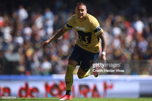 Nicolas Castillo of Pumas celebrates after scoring the third goal of his team during the second round match between Pumas UNAM and Atlas as part of...