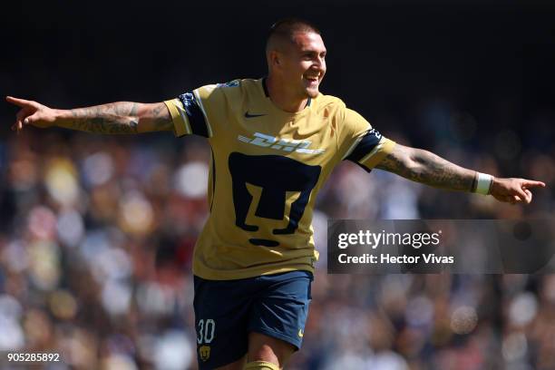 Nicolas Castillo of Pumas celebrates after scoring the third goal of his team during the second round match between Pumas UNAM and Atlas as part of...