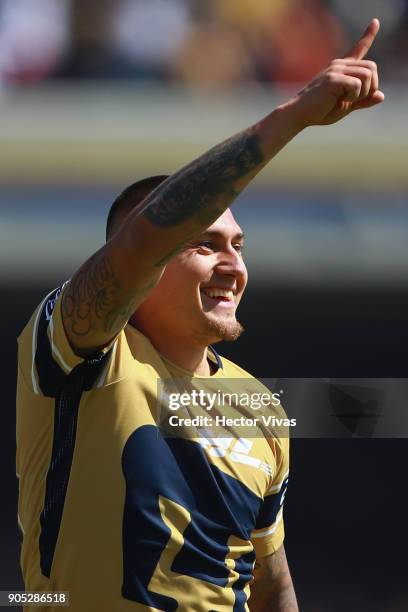 Nicolas Castillo of Pumas celebrates after scoring the third goal of his team during the second round match between Pumas UNAM and Atlas as part of...