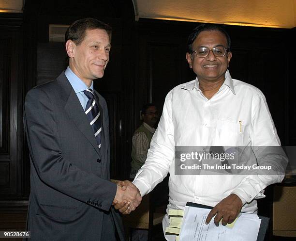 Alexander Zhukov, Deputy Prime Minister of Russia shakes hand with P Chidambaram, Union Cabinet Minister of finance in New Delhi, India