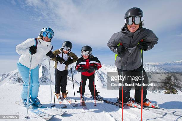 family skiing in snowbird, utah - snowbird lodge stock pictures, royalty-free photos & images