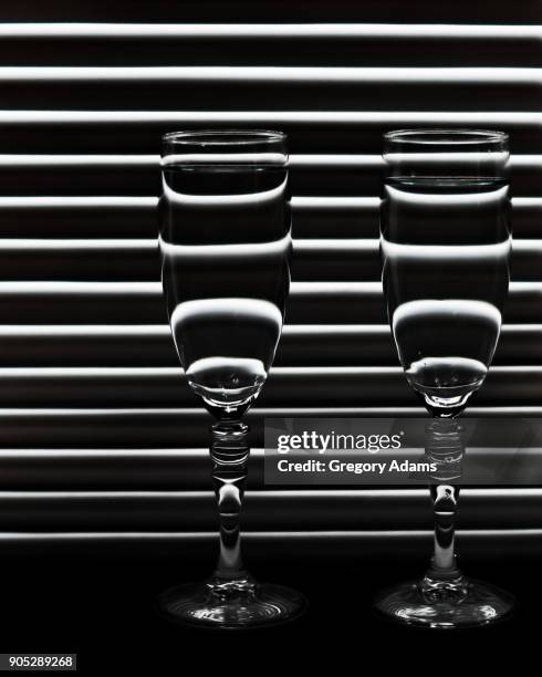 refracted light and shadow on wineglasses - hatboro stock pictures, royalty-free photos & images