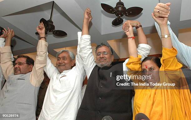 Sharad Yadav with Nitish Kumar, Chief Minister of Bihar, Sushil Modi, Deputy Chief Minister and Uma Bharti in Patna, Bihar, India