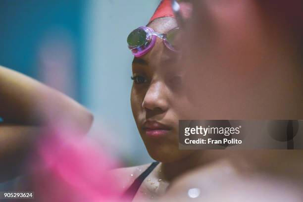 female swimmer at a swim meet. - black girl swimsuit stock pictures, royalty-free photos & images