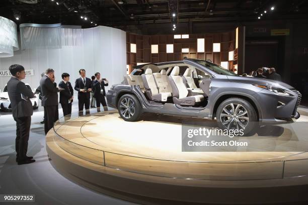 Lexus shows off a cutaway of their RX350L at the North American International Auto Show on January 15, 2018 in Detroit, Michigan. The show is open to...