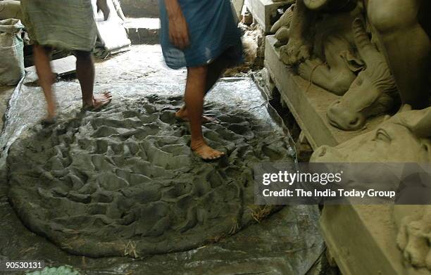 Artists making Durga idols in Kumartuli, Kolkata, West Bengal, India