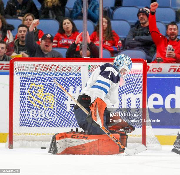 Ukko-Pekka Luukkonen of Finland reacts after giving up a goal to Slovakia during the second period of play in the IIHF World Junior Championships at...