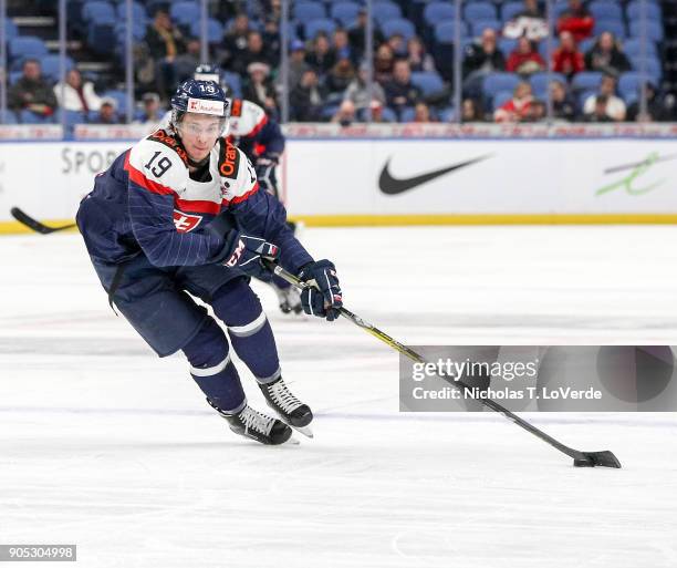 Marian Studenic of Slovakia skates the puck against Finland during the third period of play in the IIHF World Junior Championships at the KeyBank...