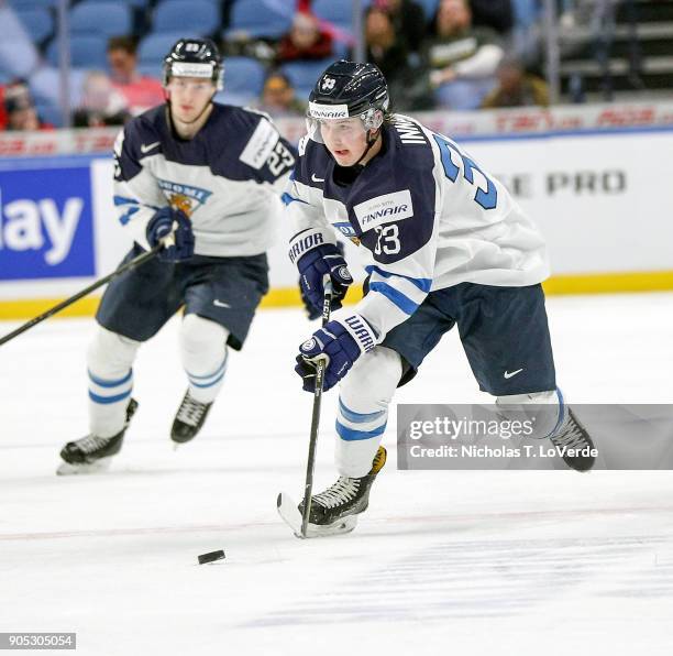 Jere Innala of Finland skate the puck up ice against Slovakia during the second period of play in the IIHF World Junior Championships at the KeyBank...