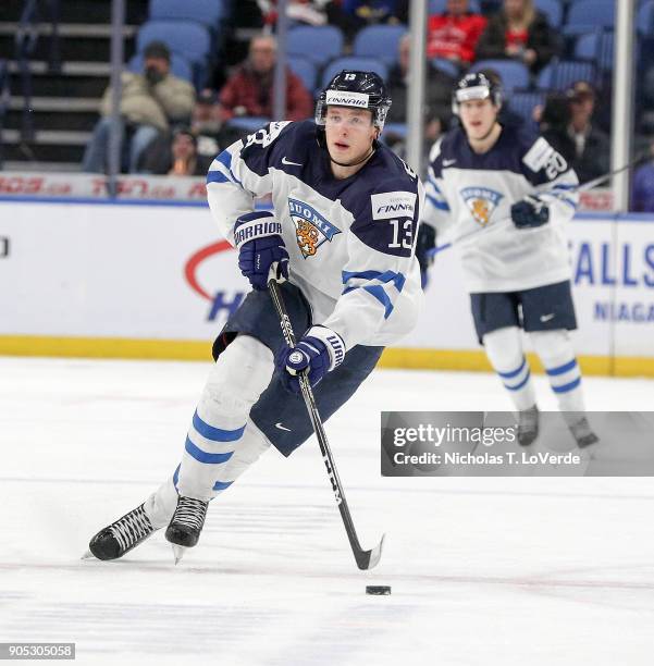 Kristian Vesalainen of Finland skates the puck against Slovakia during the second period of play in the IIHF World Junior Championships at the...