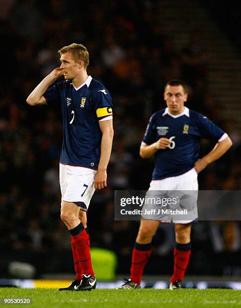 Darren Fletcher and Scott Brown of Scotland react after conceding a goal to the Netherlands during the FIFA 2010 World Cup Group 9 Qualifier match...