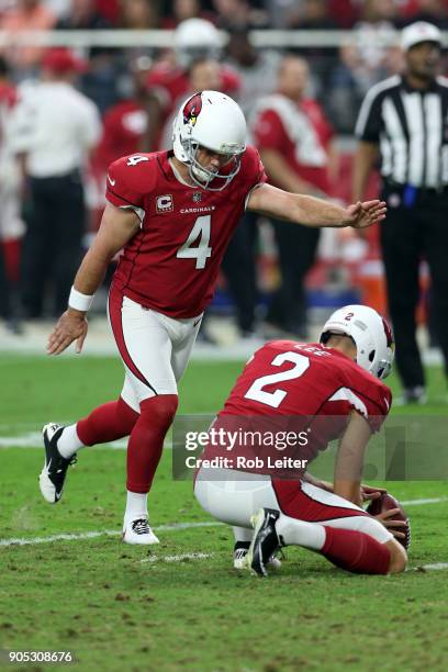 Phil Dawson of the Arizona Cardinals kicks during the game against the Los Angeles Rams at University of Phoenix Stadium on December 3, 2017 in...