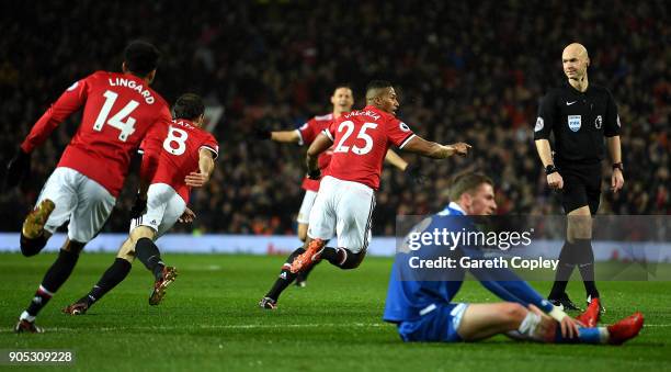 Antonio Valencia of Manchester United celebrates scoring his side's first goal during the Premier League match between Manchester United and Stoke...