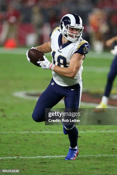 Cooper Kupp of the Los Angeles Rams runs after the catch during the game against the Arizona Cardinals at University of Phoenix Stadium on December...