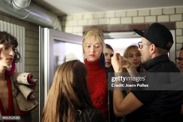 Model gets prepared ahead of the Dawid Tomaszewski show during the MBFW January 2018 at ewerk on January 15, 2018 in Berlin, Germany.