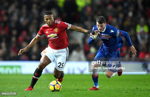 Antonio Valencia of Manchester United and Josh Tymon of Stoke City in action during the Premier League match between Manchester United and Stoke City...