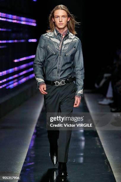 Model walks the runway at the Dsquared2 show during Milan Men's Fashion Week Fall/Winter 2018/19 on January 14, 2018 in Milan, Italy.