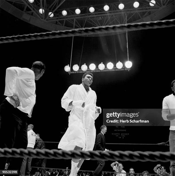 World Heavyweight Title: Muhammad Ali wearing robe in ring during introductions before fight vs Cleveland Williams at Astrodome. Houston, TX CREDIT:...