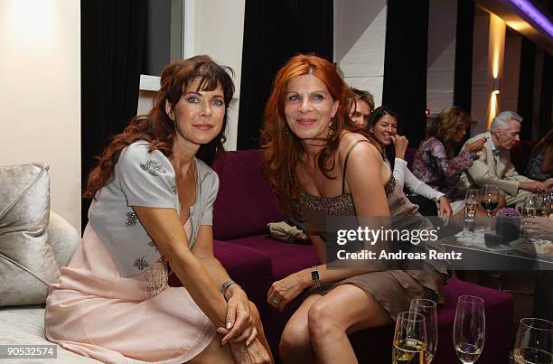 Actress Anja Kruse and actress Claudia Wenzel attend the Leonardo Royal Hotel grand opening on September 9, 2009 in Berlin, Germany.
