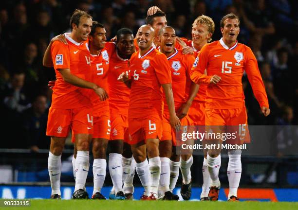 Eljero Elia of Netherlands celebrates with teammates after scoring during the FIFA 2010 World Cup Group 9 Qualifier match between Scotland and...