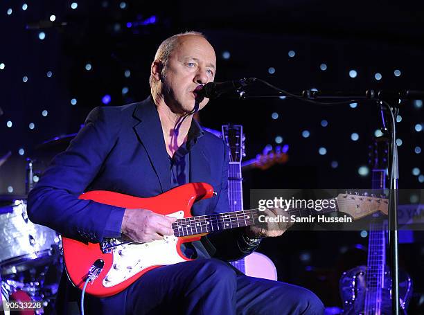Mark Knopfler performs in aid of The Prince's Trust at the Hurlingham Club on September 9, 2009 in London, England.