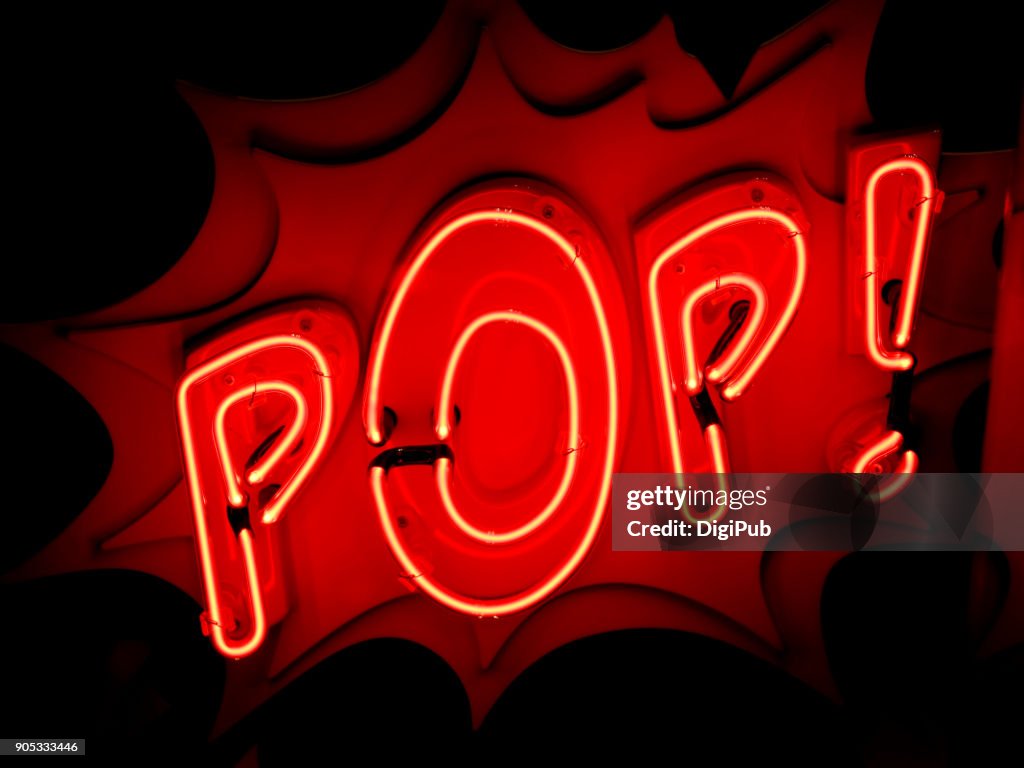 Red neon sign “POP!”
