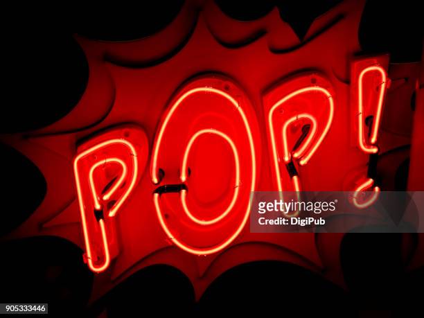 red neon sign “pop!” - musica pop foto e immagini stock