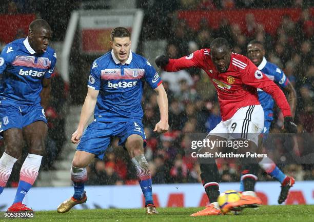 Romelu Lukaku of Manchester United scores their third goal during the Premier League match between Manchester United and Stoke City at Old Trafford...