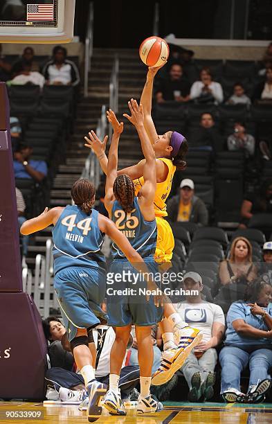 Candace Parker of the Los Angeles Sparks shoots over Monique Currie of the Washington Mystics during the game on August 18, 2009 at Staples Center in...