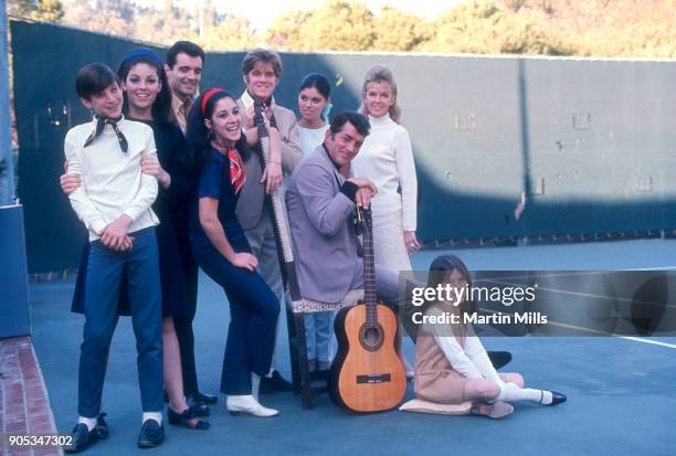 American singer, actor and comedian Dean Martin poses with his wife Jeanne and children Ricci Martin , Gail Martin, Craig Martin, Claudia Martin ,...