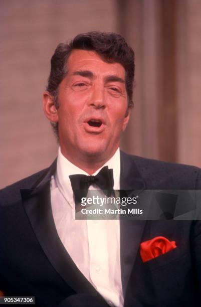 American singer, actor and comedian Dean Martin sings on the set of 'The Dean Martin Show' Christmas special in 1967 in Los Angeles, California.