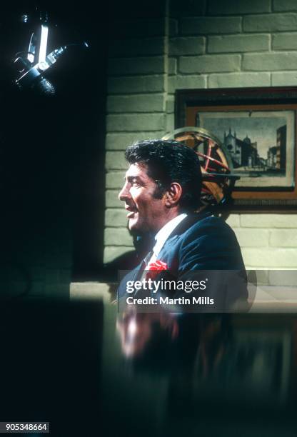 American singer, actor and comedian Dean Martin looks on during the taping of 'The Dean Martin Variety Show' circa 1967 in Los Angeles, California.