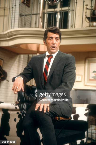 American singer, actor and comedian Dean Martin sings on set during the taping of 'The Dean Martin Variety Show' circa 1967 in Los Angeles,...