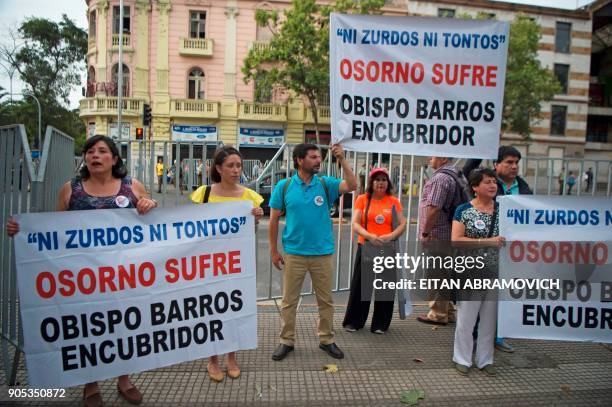 Demonstrators protest at the arrival of Pope Francis in Santiago, on January 15, 2018. Several Bishops have been recently acused of pederasty. Pope...