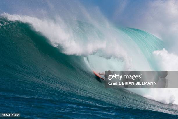Surfer wipes out at Pe'ahi, also known as Jaws, during big wave surfing on January 14, 2018. / AFP PHOTO / brian Bielmann / RESTRICTED TO EDITORIAL...