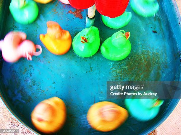 crazy duck fair ground game - rubber duck carnival game stock pictures, royalty-free photos & images