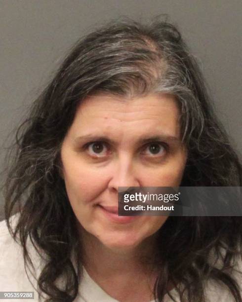 In this handout provided by the Riverside County Sheriffs Department, Louise Anna Turpin poses for a mugshot after being arrested when 13 siblings...