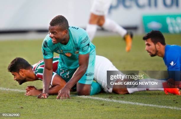 Jonathan Betancurt from Barcelona SC of Ecuador smiles after beating goal keeper Marcos Felipe and defender Welington Gum Pereira of Brazilian club...