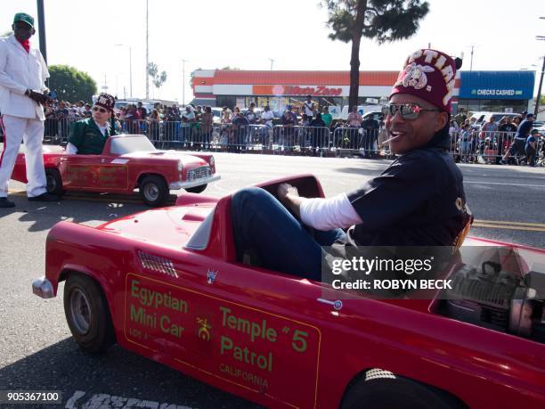 Shriners in mini cars participate in the 33rd annual Kingdom Day Parade honoring Dr. Martin Luther King Jr., January 15, 2018 in Los Angeles,...