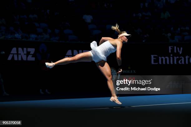 Carina Witthoeft of Germany serves in her first round match against Caroline Garcia of France on day two of the 2018 Australian Open at Melbourne...