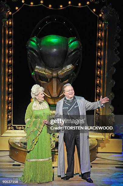 Madame Morrible , played by Maggie Kirkpatrick, and The Wizard of Oz , played by Bert Newton, perform in the highly acclaimed Broadway musical...