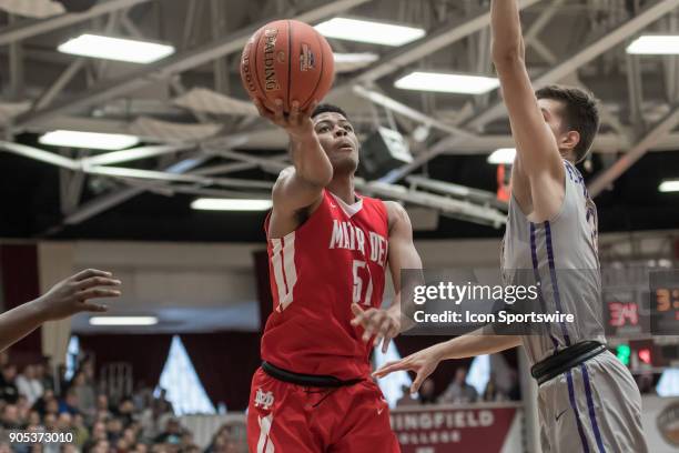 Mater Dei Monarchs guard Harrison Butler drives to the basket during the first half of the Spalding Hoophall Classic high school basketball game...