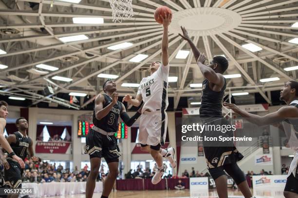 Hudson Catholic Hawks guard Jahvon Quinerly drives to the basket during the second half of the Spalding Hoophall Classic high school basketball game...