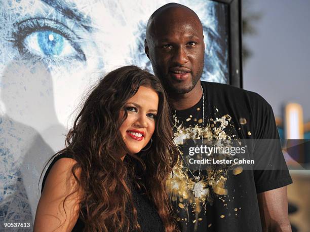 Personality Khloe Kardashian and NBA player Lamar Odom arrives on the red carpet of the Los Angeles premiere of "Whiteout" at the Mann Village...