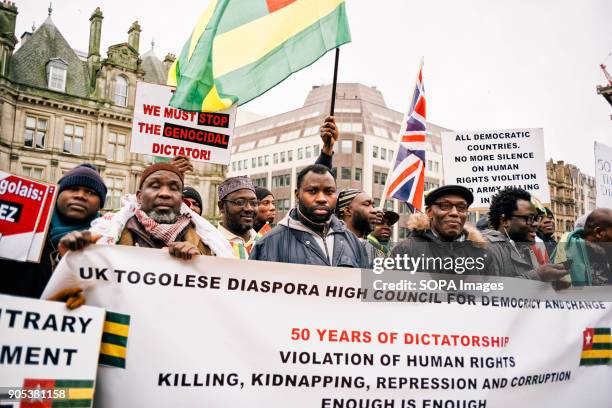 Man looks to camera as the 'UK Togolese Diaspora High Council For Democracy and Change' holds a peaceful demonstration outside Birmingham Town Hall,...