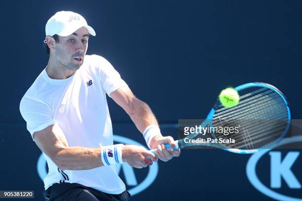 Jordan Thompson of Australia plays a backhand in his first round match against Nicolas Kicker of Argentina on day two of the 2018 Australian Open at...